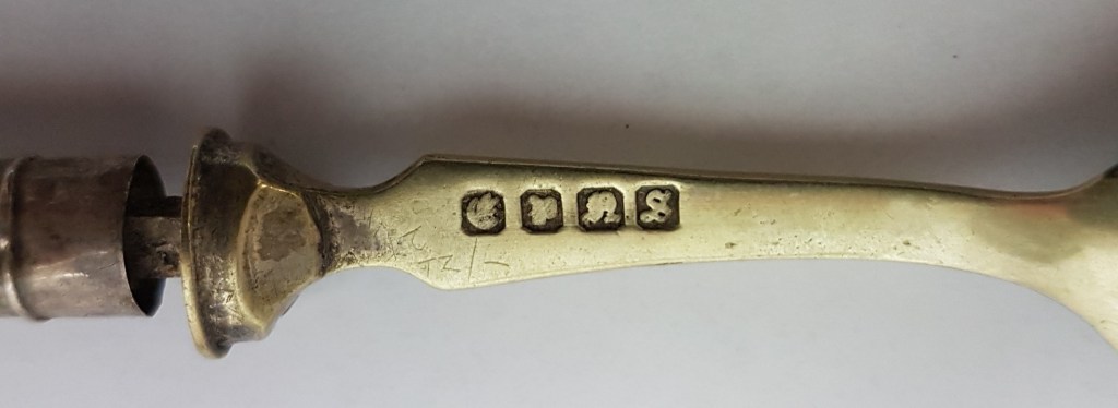 Hallmark detail of Scottish wedding spoons, c1903, gold, held in a private collection.